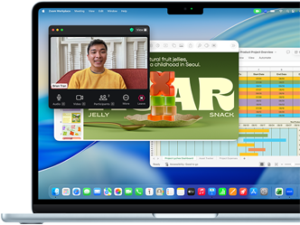 Eine Keynote Präsentation, eine Microsoft Excel Tabelle und ein Zoom Anruf sind gleichzeitig auf einem 13 Zoll MacBook Air geöffnet